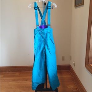 Size medium snow overalls. Very warm and snug.